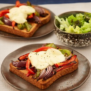 Grilled pepper, onion and melted mozzarella on a slice of wholemeal toast