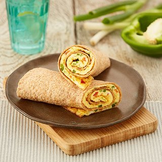 2 rolled up wraps with vegetable omelette filling