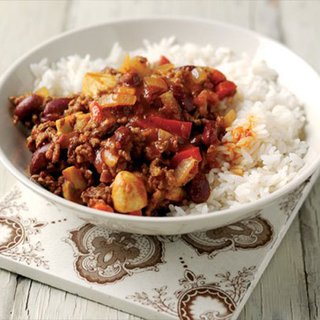 Chilli made with beef, mushrooms, peppers and kidney beans served with rice