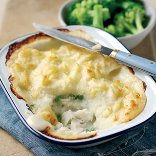 Mash-potato-topped fish pie in a casserole dish