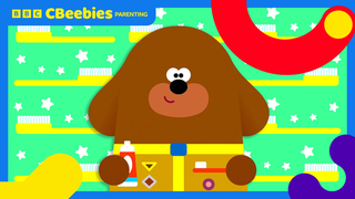 Cartoon character of a dog "Hey Douggie" on a colourful background, showing the BBC CBeebies Parenting logo.