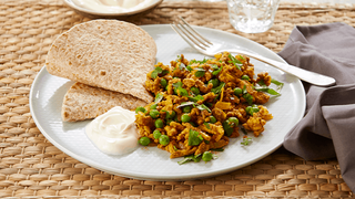 Keema made with minced turkey and peas, served with chapati and yoghurt