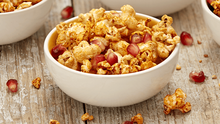 Piri-piri pomegranate popcorn - Recipes - Healthier Families - NHS
