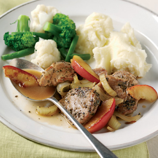 Roast pork with apples celery, broccoli and mash potato