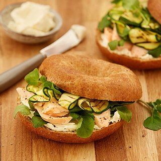 Bagel filled with salmon, courgette, soft cheese and watercress