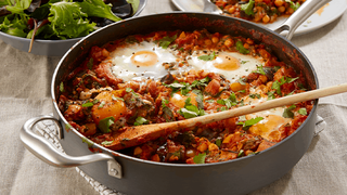 A pan of shakshuka – vegetables and eggs baked in a rich tomato sauce