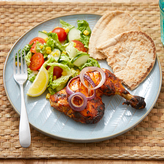 Tandoori grilled chicken, served with side salad and naan