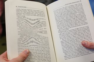 Blurry book showing what vision is like for a person with early AMD