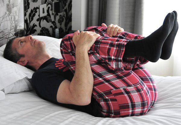 Knees to chest stretch