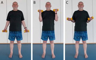 3 images showing someone doing a sequence of 3 different positions. The first image shows someone with a hand weight in each hand, their arms are relaxed by their side. The second image shows the arms bent with each hand and hand weight in line with their shoulder. The 3rd image shows the arms being lowered back down to the starting position.