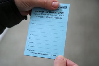 A blue steroid card which shows the information you would need to complete. It includes spaces for you to write your name, address, phone number and GP and hospital details.
