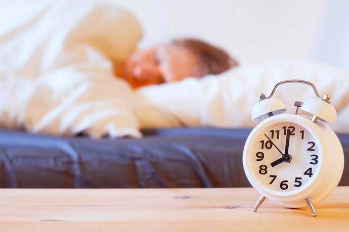 woman sleeping on blow-up bed