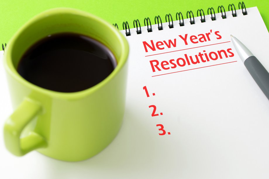 Picture of a cup of coffee and a blank list titled New Year's resolutions